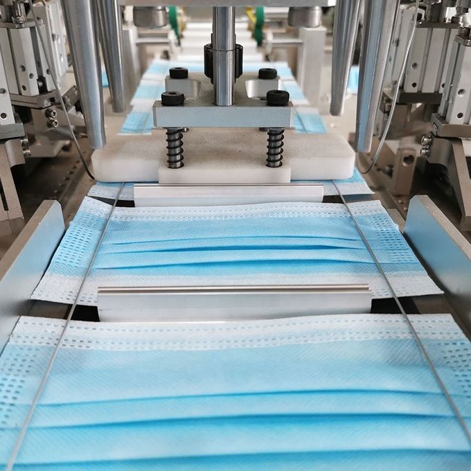 Masque protecteur complètement automatique jetable non tissé faisant la machine 0